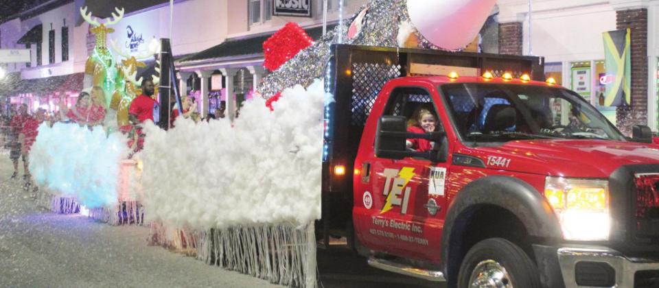 Terry's Electric's imaginative float. It brought the snow, too ...