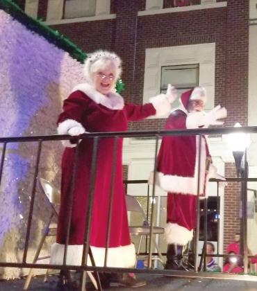 Santa and Mrs. Claus round out the parade -- he knows if you've been bad or good!