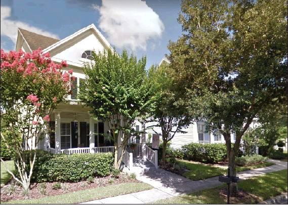 PHOTO/GOOGLE MAPS Above is a photo of 202 Reserve Place, in the North Village area of Celebration, where four people were found dead on Monday.