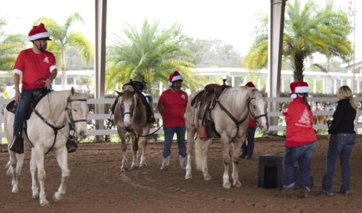 McCormick Research Institute drill team members mount up for a recent practice. PHOTO/TERRY LLOYD