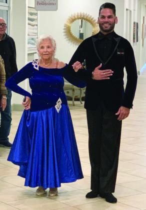 Competitive ballroom dancer Jeannette Dunstan with her partner Eddie Rivera. SUBMITTED PHOTO