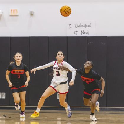 The Gateway Panthers and point guard Alyssa Marino aim high, just like going for this loose ball, at a return trip to the Class 5A state tournament; a win Friday against New Smyrna Beach gets them there. (Photo/Taylor McFee)