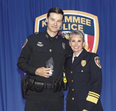 Kissimmee Police Chief Betty Holland with Employee of the Year, Detective Cyle Smallwood. PHOTO/KISSIMMEE POLICE DEPARTMENT