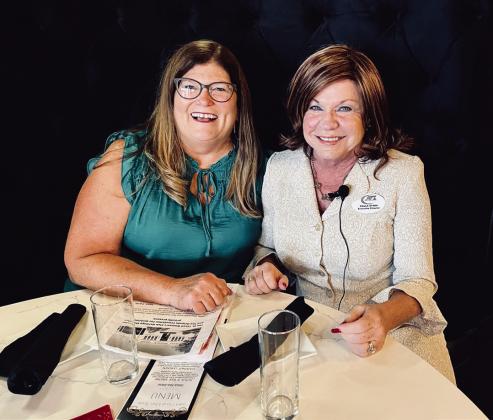News-Gazette publishers past and present: Rochelle Stidham (left) and St. Cloud Main Street Director Paula Stark