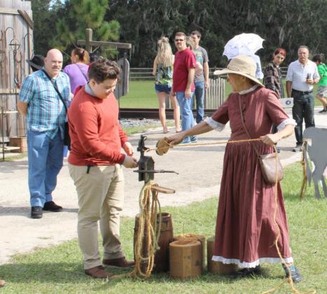 Diane Riggleman Demonstrates a 1901 Rope Making Machine