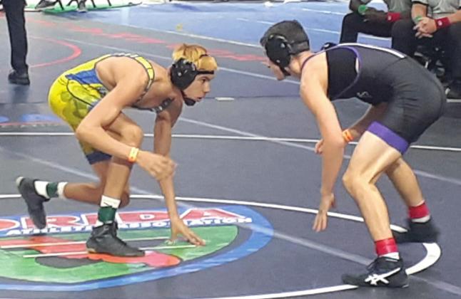 Osceola’s Cooper Haase (left) was one of the three Kowboys state champions last year. PHOTO/J. DANIEL PEARSON