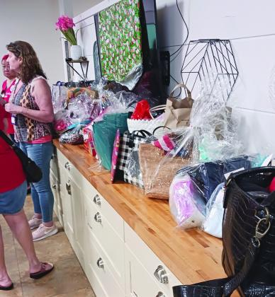 The Republican Women Crusaders offered up “Christmas in July” to families at a local shelter.