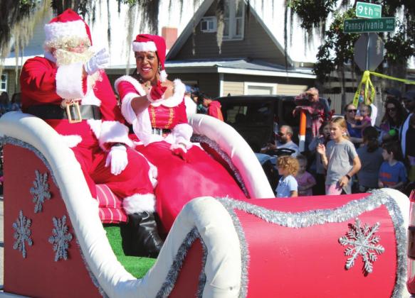 The couple at the end of the parade were a "Claus" for excitement