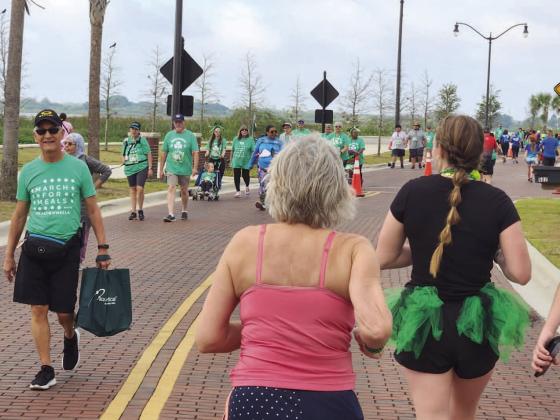 Some 380 participants in the Osceola Council on Aging’s March for Meals 5K on March 11 raised $25,000 for the county’s Meals on Wheels program. PHOTO/KEN JACKSON