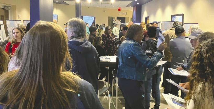 Concerned residents pack the lobby of St. Cloud City Hall on Tuesday to hear about zoning changes in the Future Land Use Map along Lakeshore Boulevard and Florida Avenue proposed for limited commercial uses. PHOTO/TERRY LLOYD