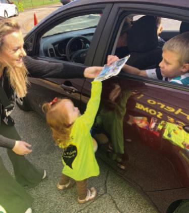 The little-est volunteer — Photos Courtesy of A Hero For Kids