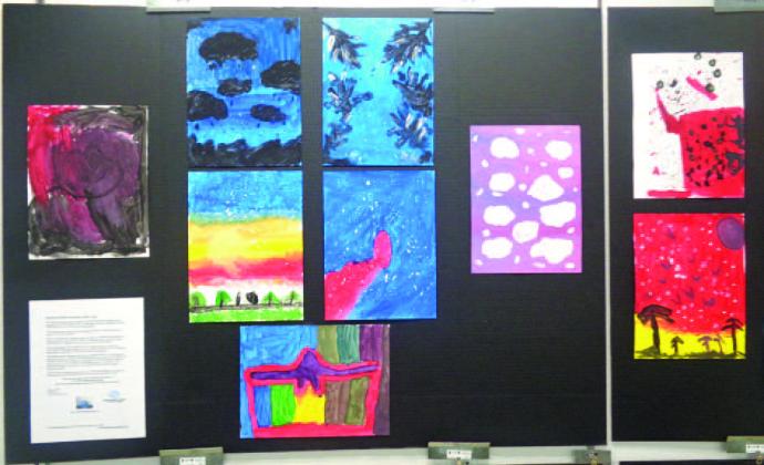 Teen artwork from the World Youth Expo (WYE) Project’s REFLECTIONS: Portraits of Who I Am are on display at the St. Cloud library. SUBMITTED PHOTO