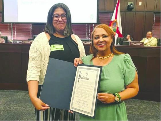 Nicole Santiago from the Osceola Council on Aging was presented with an Alzheimer’s and Brain Awareness Proclamation for the Council’s Adult Day Care &amp;amp; Health Clinic by Osceola County Commission Chair Viviana Janer. (Photo/Osceola Council on Aging)
