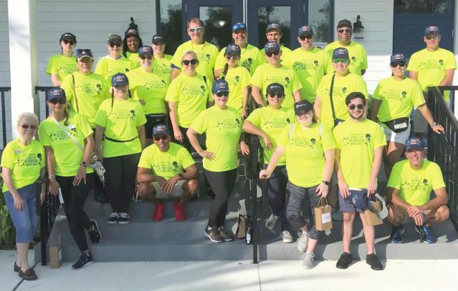 Osceola County Association of REALTORS® volunteers participating in the “Clean Up Florida Waters” project. PHOTO/OSCAR