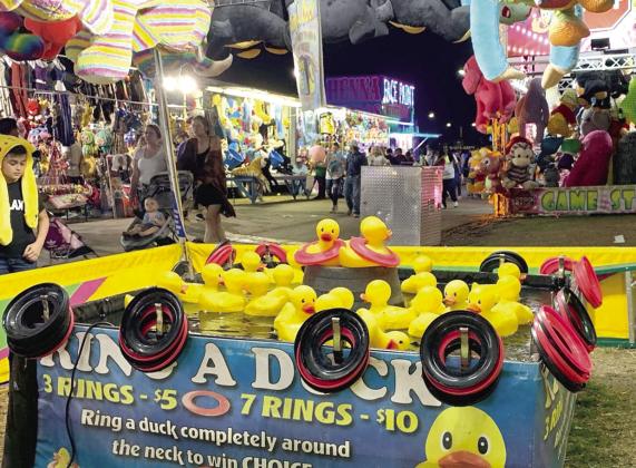 The Osceola County Fair is about food, fun, games, rides and See Page 7. entertainment, as it’s been for 80 years. It opens again on Friday. FILE PHOTO