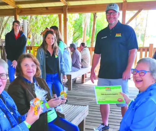 Wild Florida Adventure Park Co-owner Sam Haught and his team surprised the Raegan family just before their ride, presenting them with a certificate as the one millionth guests on its airboat rides. (Photo/Jennifer Chalifoux)
