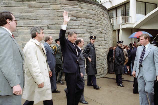 President Ronald Reagan waves moments before he was shot in 1981 by John Hinckley. PHOTO/ RONALD REAGAN PRESIDENTIAL LIBRARY &amp; MUSEUM VIA NEWS SERVICE OF FLORIDA