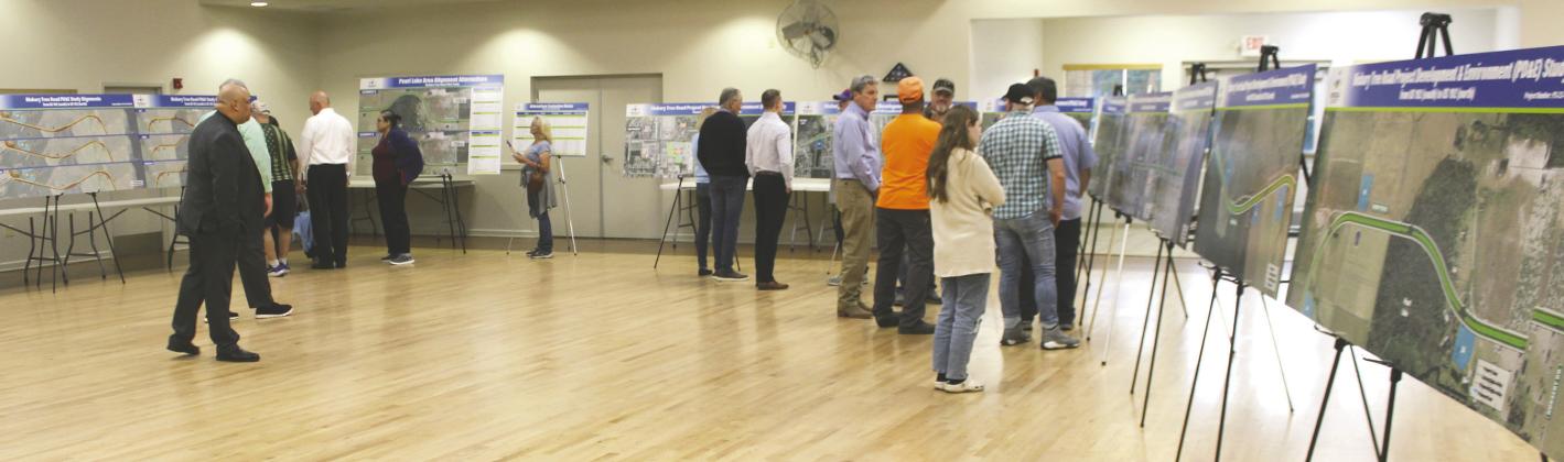 Hickory Tree Road realignment plan displays, including one for the Pearl Lake area, took up half of the St. Cloud Community Center. PHOTO/TERRY LLOYD