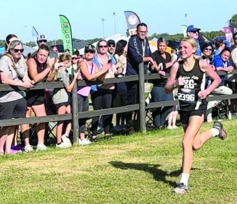 St. Cloud’s Ireland Wright came from behind to win the Florida Youth Running Association middle school cross country state championship in Lakeland. SUBMITTED PHOTO