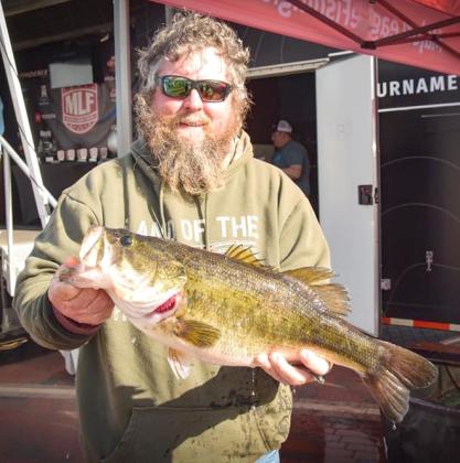 St. Cloud’s Ray Trudeau (with two fish) and Richard Ralston took home big fish and bigger prizes at last weekend’s Major League Fishing Phoenix Bass Fishing League Gator Division tournament on the Kissimmee chain. PHOTOS/CINDY JOINT