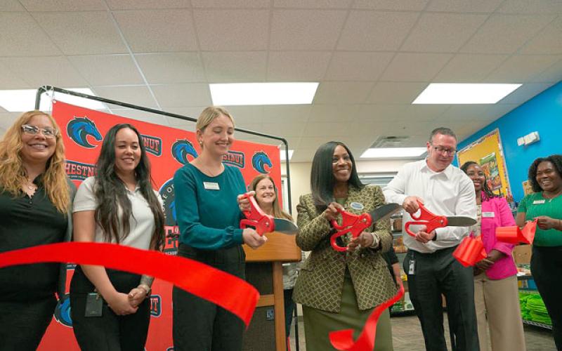 Chestnut Elementary School in Poinciana cut the ribbon on its new school food pantry made possible by an investment the Poinsette Foundation made in four county schools. (Photo/Second Harvest Food Bank)