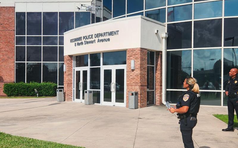 Kissimmee Police Officer Astrid Cruz pilots one of the agency’s new drones that officials say will assist in missing persons investigations and other law enforcement matters best seen from above. (Photo/Ken Jackson)