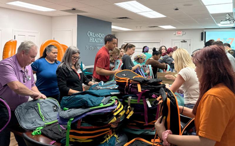 At Orlando Health St. Cloud Hospital, team members packed school supply kits in backpacks benefiting the Education Foundation Osceola County as part of ‘407 Day’. (Photo/Orlando Health)