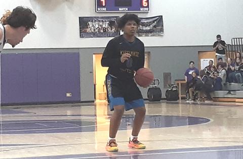 NEWS-GAZETTE PHOTO/J. DANIEL PEARSON Osceola Kowboys point guard Tyrese Carabello gets ready to release a free throw against Celebration. Carabello had three points in Osceola’s 60-48 win over the Storm.