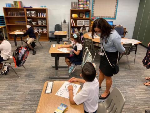 Osceola County Schools Superintendent Debra Pace tours a local school last summer during the height of the COVID-19 pandemic when face masks were required in all schools and school district buildings.