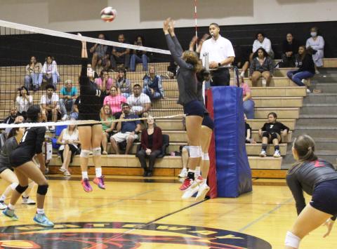 Gateway's Paige Alise (11) goes up for a kill against Fivay in Wednesday's regional volleyball playoff victory, the first in school history. PHOTO/KEN JACKSON