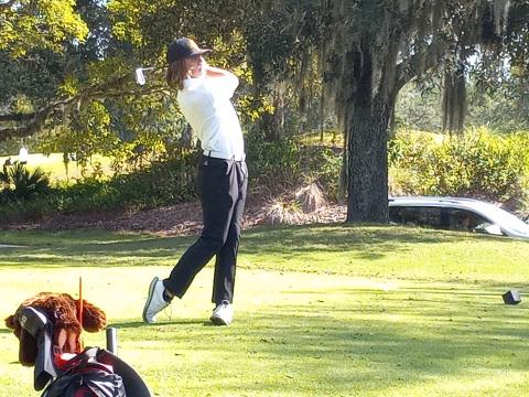 Alex Owen tees off on the 154-yard, Par 3 #12 at Orange Lake Legends course.  Owen struck the tee shot 15-feet left of the hole and made the birdie putt on his way to a seven-over 79.  PHOTO/DAN PEARSON