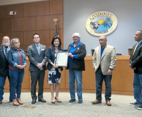 Twis Lizasuain, Chief Executive Officer for the Osceola County Association of Realtors® and Realtor® member and the City of Kissimmee’s Affordable Housing Chairman Robert Bussiere, accepted a proclamation for Fair Housing Month from Mayor Olga Gonzalez and the Kissimmee City Commission April 5. PHOTO/OSCAR
