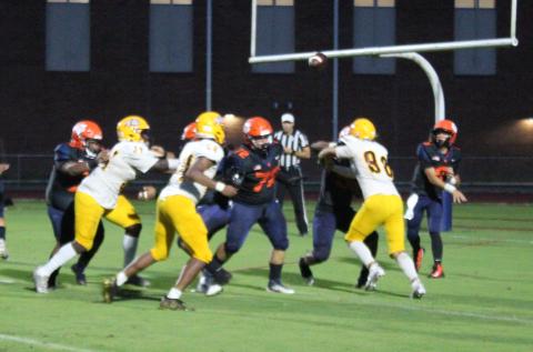 Tohopekaliga quarterback (right) throws a pass in Friday's 47-6 win over St. Cloud. PHOTO/KEN JACKSON