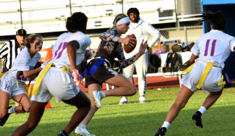 Drea Thompson returns an interception in Thursday's flag football District 2A-9 title game. PHOTO/KATIE WHITT WILLIAMS
