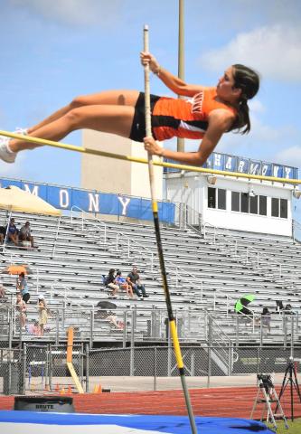 Hannah Vickers won the pole vault (pictured), broke Harmony’s record in the triple jump and also qualified for regionals in the javelin as the Longhorns won the District 4A-9 girls track team championship. PHOTO/KATIE WILLIAMS