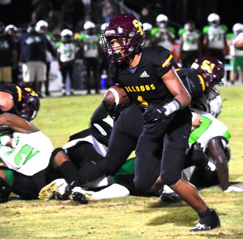 T.J. Griffin, shown in August's Kickoff Classic, rushed for touchdown and intercepted a pass in St. Cloud's 42-7 win over Liberty Friday. PHOTO/KATIE WILLIAMS