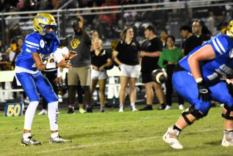 Osceola quarterback Caden West connected on all nine of his passes Friday and threw for five touchdowns in the 56-0 rout of Celebration. PHOTO/KATIE WILLIAMS