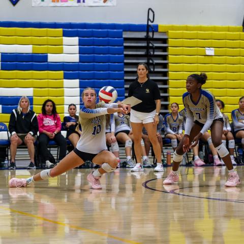 Osceola's Sophie Spivey makes a dig in Wednesday's regional quarterfinal playoff match against Windermere. PHOTO/TAYLOR MCFEE