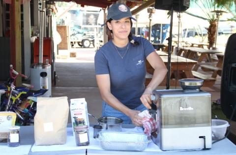 Nadya Ali serves a Puerto Rican latte from Mango Bird Coffee Project in Kissimmee. PHOTO/MICHELLE KOSTUCH