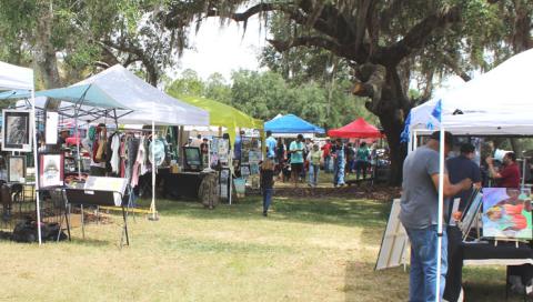 Over 100 people attended the memorial service for Marine veteran John Snider Saturday at Mount Peace Cemetery, that was followed by the McCormick Research Institute fundraising art show. (Photo/Terry Lloyd)