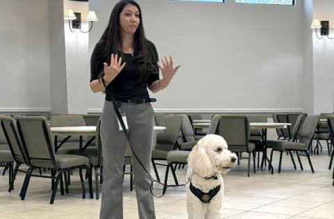 Nicole Segarra, Victim Advocate with the St. Cloud Police Department, along with “George,” speaking at a recent meeting of the Seeds of Hope in St. Cloud. (Photo/Terry Lloyd)