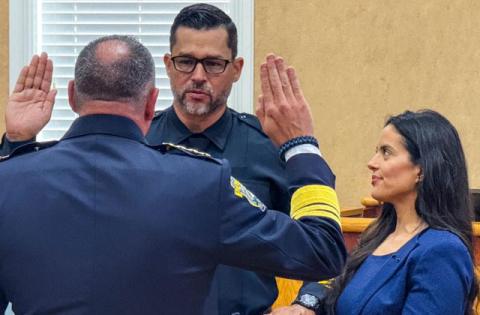 New SCPD Deputy Chief Jacob Ruiz gets his insignia pinned by wife Sadia Baxter at Tuesday's swearing-in ceremony.  (Photo/St. Cloud Police)