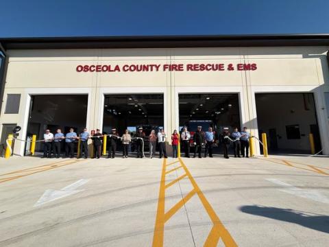 District 1 Commissioner Peggy Choudhry, Fire Chief Larry Collier, Osceola County leadership, Fire Rescue EMS department staff and Station 75 personnel perform the ceremonial "uncoupling" to officially open Station 75 for service on Funie Steed Road Wednesday. (Photo/Osceola County Fire Rescue EMS)