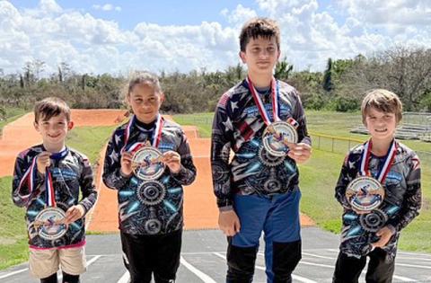 Local BMX riders Jameson Hilbush 8, Norah Gonzalez 9, Martin Giraldo 13, Elijah Taylor 9, have recently qualified for the 2026 UCI World BMX Championship in Brisbane, Australia this July out of the St. Cloud track. (Submitted photo)