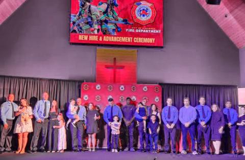 These are some of the new families that are now part of the Kissimmee Fire Department family after being sworn in as part of a record class Thursday. (Photo/Ken Jackson)