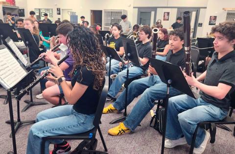 Osceola County School for the Arts’ Wind Ensemble rehearses Monday ahead of next week’s trip to suburban Washington, D.C. for the President’s Cup National High School Concert Band Invitational. The band will appear with the U.S. Army Band. (Photo/Ken Jackson)