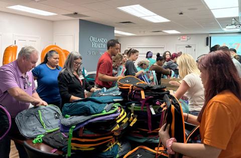 At Orlando Health St. Cloud Hospital, team members packed school supply kits in backpacks benefiting the Education Foundation Osceola County as part of ‘407 Day’. (Photo/Orlando Health)