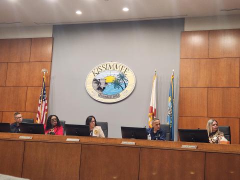 Kissimmee City Commissioners (from left) Noel Ortiz, Vice Mayor Angela Eady, Mayor Jackie Espinosa, Carlos Alvarez III and Janette Martinez listen in as City Manager Mike Steigerwald explains the process of determining if the city will send ethics complaints on to the Ninth Circuit Court at Tuesday's City Commission meeting. (Photo/Ken Jackson)