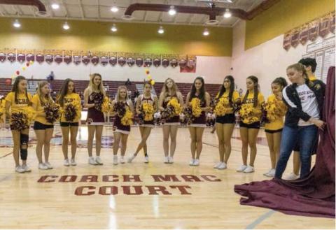 NEWS-GAZETTE PHOTO/ROB HERBERT On Monday, St. Cloud High School officially renamed and dedicated the newly refurbished basketball floor at St. Cloud Gymnasium as the “Coach Mac Court” prior to a girls varsity basketball game.