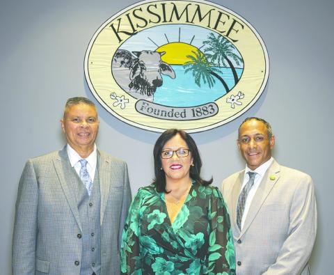 From left, Commissioner Noel Ortiz, Mayor Jackie Espinosa and incumbent Commissioner Carlos Alvarez were sworn in for their terms. PHOTOS/KEN JACKSON & CITY OF KISSIMMEE